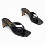 Croc-effect toe mules