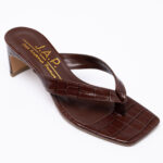Croc-effect toe mules