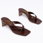 Croc-effect toe mules